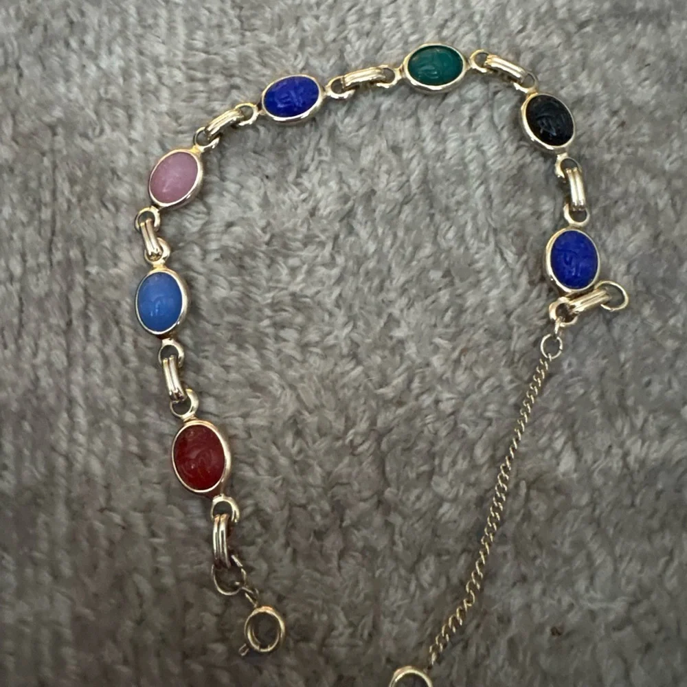 EUC multi stone gold tone bracelet